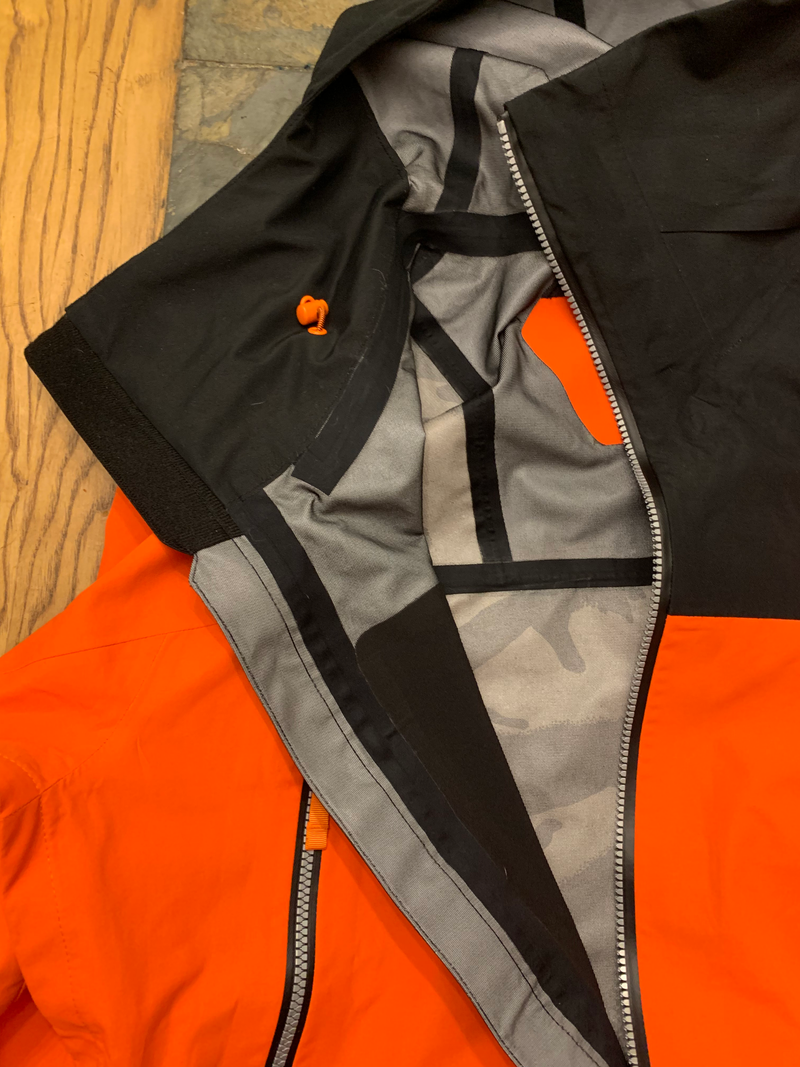 There is a little patch of fleece at the neck/chin of the zipper closure. You can see here that this is just a thin 3-layer shell with no insulation to speak of, but it is heavier and more durable than a summer 2 or 2.5 layer shell with the waterproofing membrane exposed or under mesh on the inside. I used to wear insulated ski jackets, but anymore I prefer to just layer under a shell.